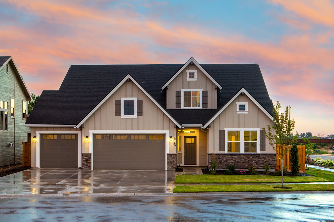 Beautiful home with new siding and roofing by Littlefield Siding